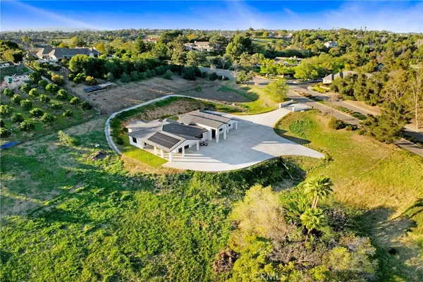 a view of a swimming pool with a yard