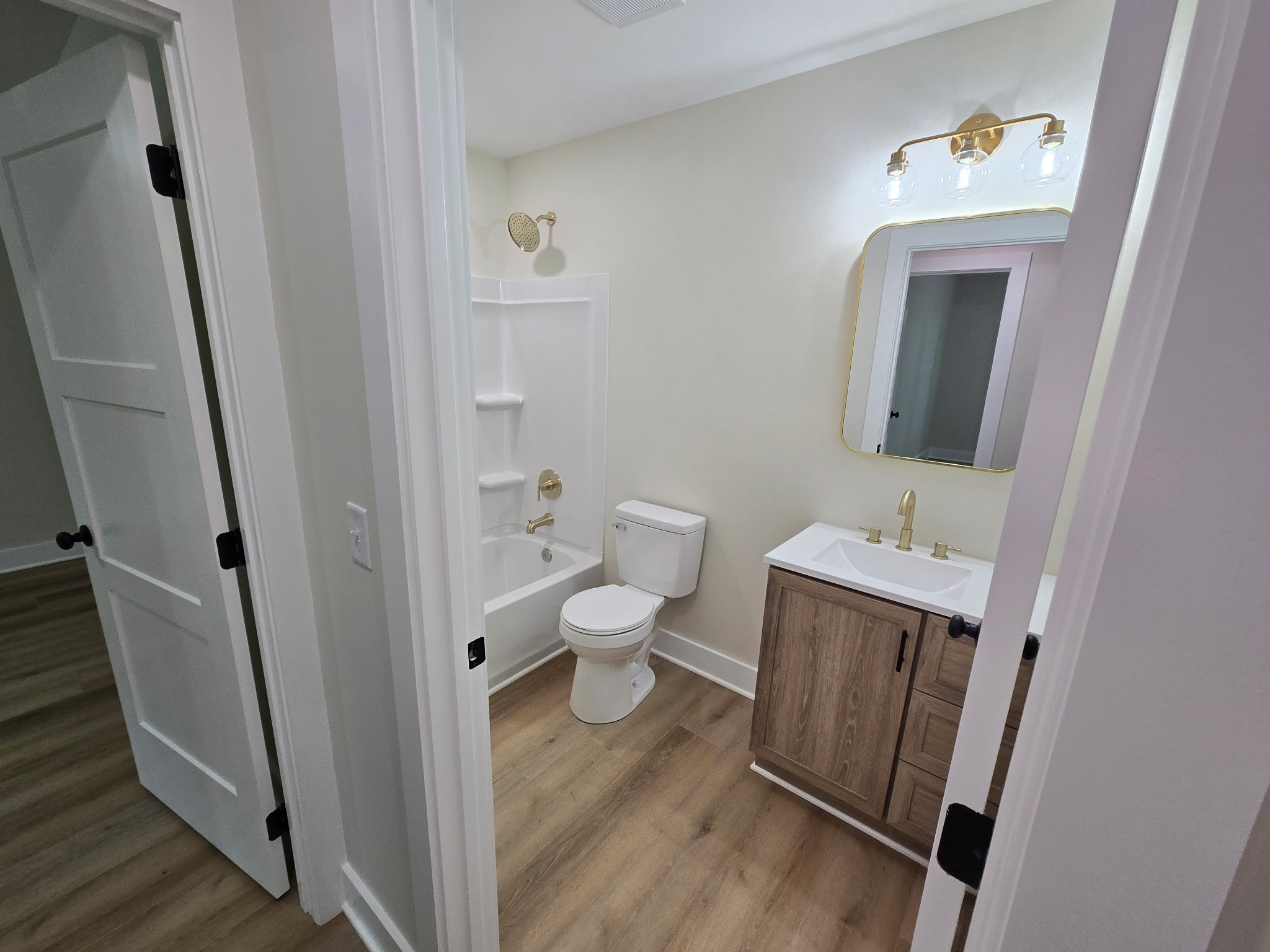 841 Lucas Road Dickson, TN 37055 - Photo 15 of 21 a bathroom with a toilet sink and mirror