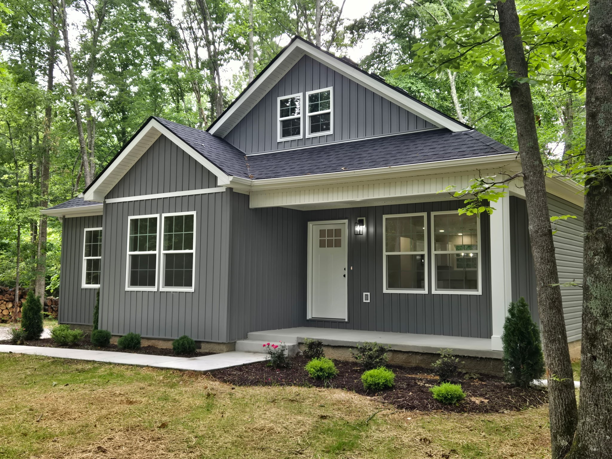 841 Lucas Road Dickson, TN 37055 - Photo 2 of 21 a front view of a house with garden