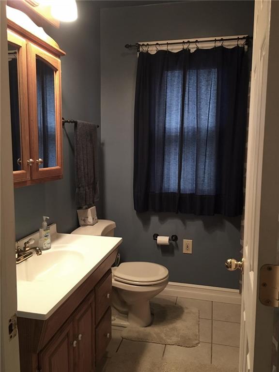 213 Darlington Road Beaver Falls, PA 15010 - Photo 10 of 16 Updated bathroom with tile floor and fresh paint!