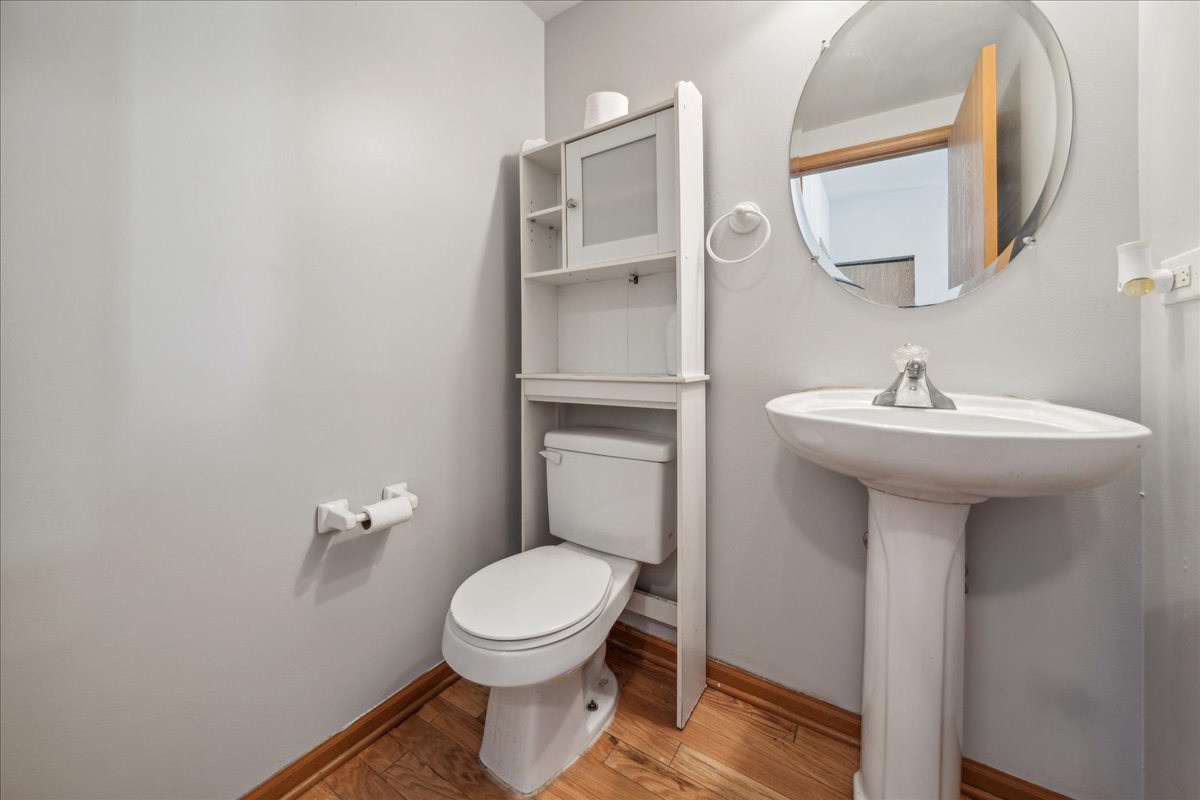 746 County Line Road Aurora, IL 60502 - Photo 9 of 16 a bathroom with a sink toilet and mirror