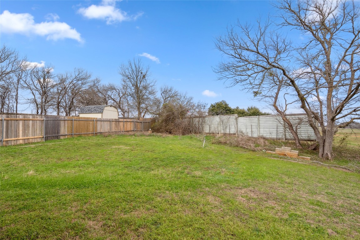 826 Savannah Cove Elgin, TX 78621 - Photo 27 of 35 Large Backyard