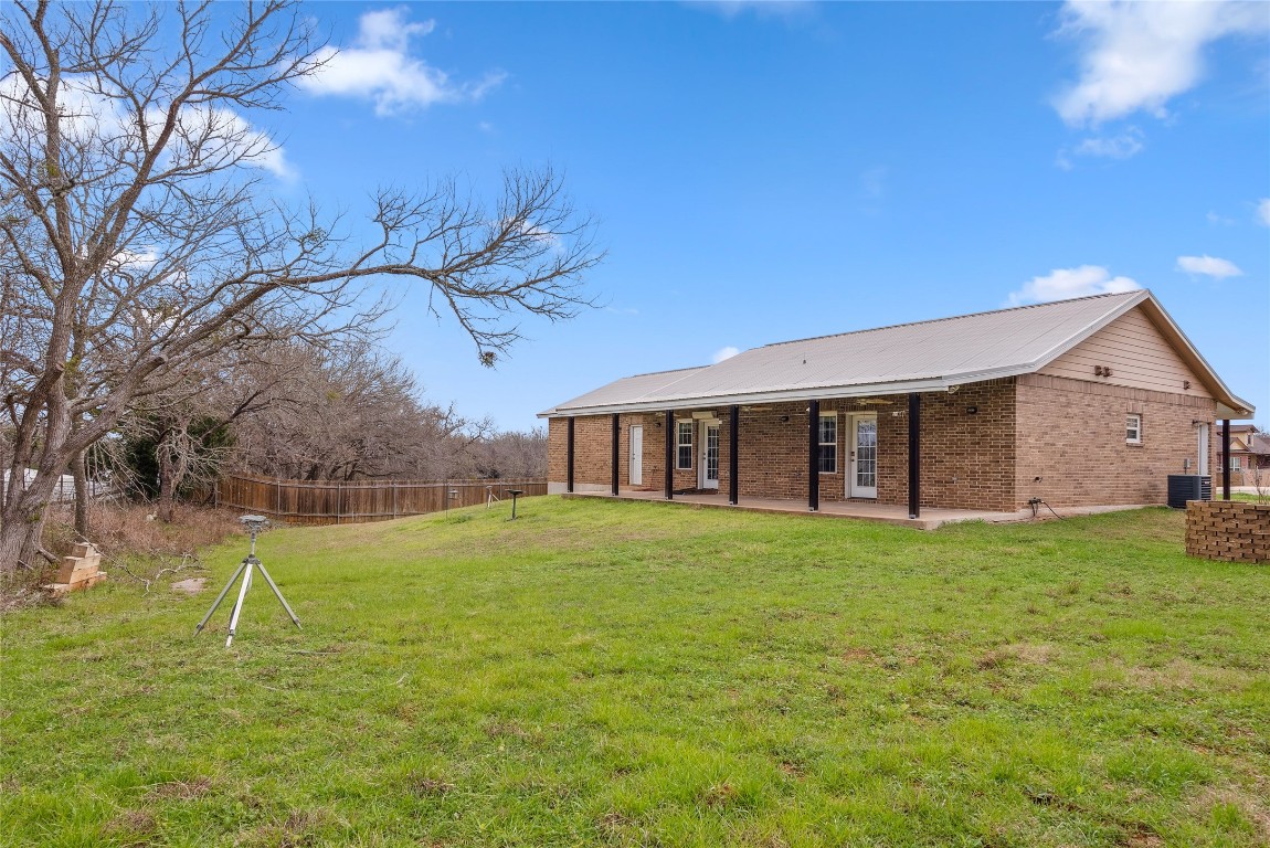 826 Savannah Cove Elgin, TX 78621 - Photo 30 of 35 Backyard
