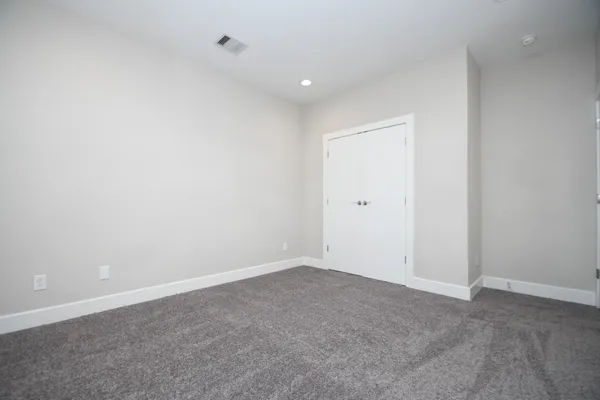 an empty room with an entryway