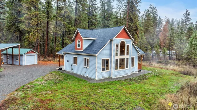 a front view of a house with yard