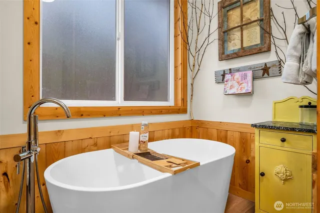 a bathroom with a sink and a bathtub