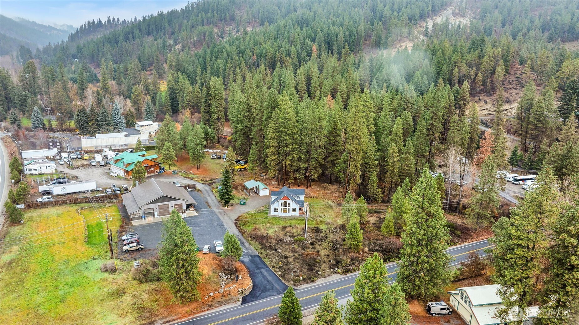 11650 Eagle Creek Road Leavenworth, WA 98826 - Photo 37 of 38 a view of a swimming pool and outdoor seating