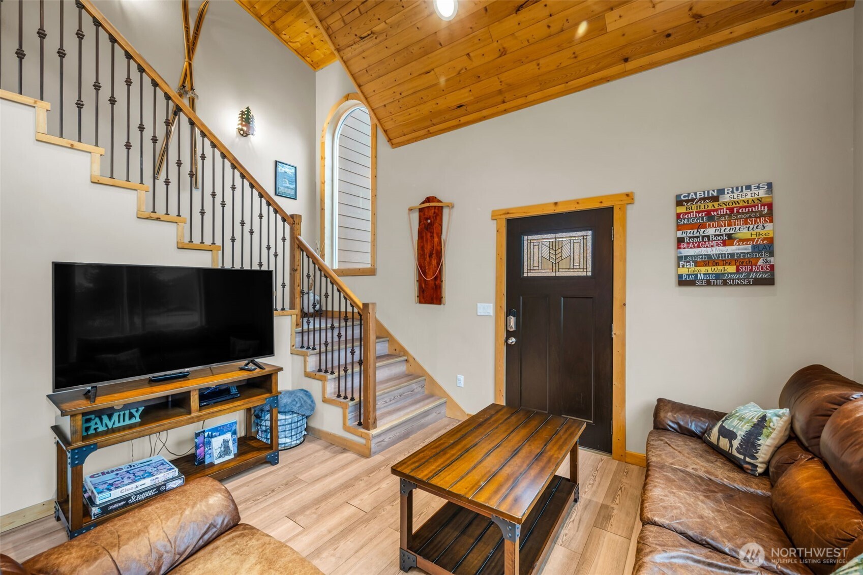 11650 Eagle Creek Road Leavenworth, WA 98826 - Photo 5 of 38 a living room with furniture and a flat screen tv