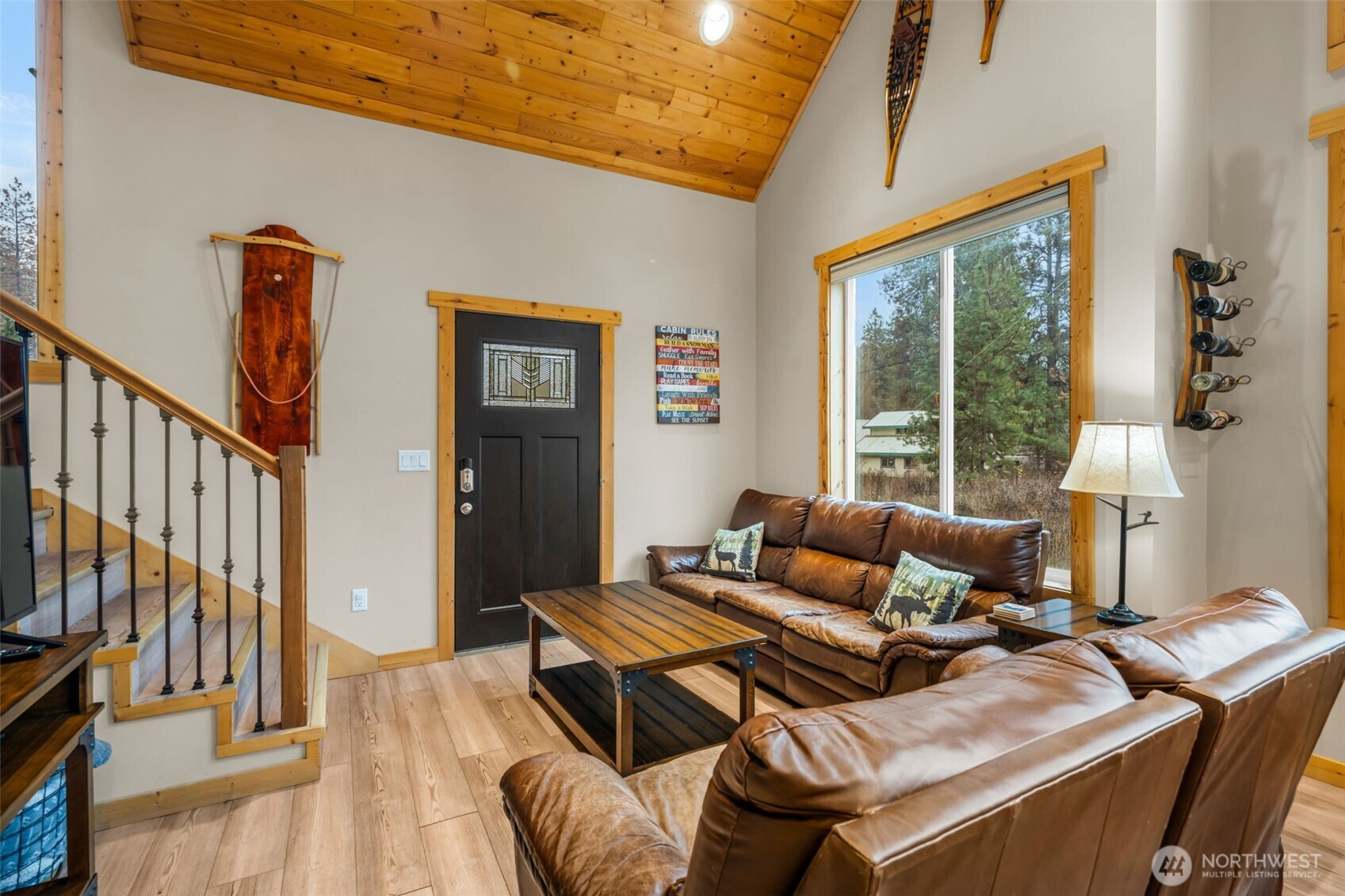 11650 Eagle Creek Road Leavenworth, WA 98826 - Photo 6 of 38 a living room with furniture and a flat screen tv