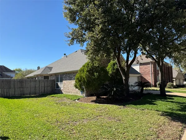 a view of a backyard with a garden