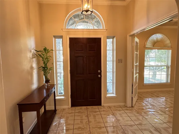 a view of livingroom with hardwood floor and hallway