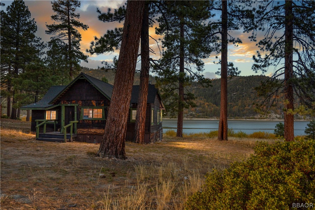 32 Big Bear Boulevard Big Bear Lake, CA 92315 - Photo 1 of 41 a view of a house with a tree in the yard