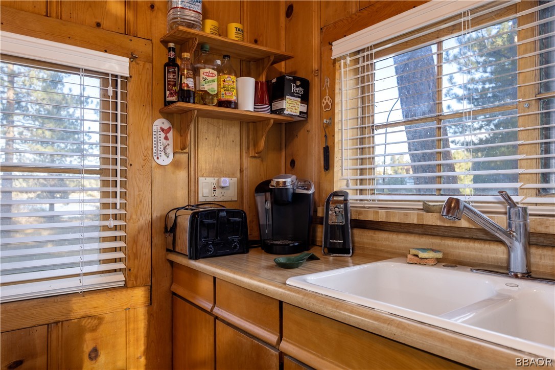 32 Big Bear Boulevard Big Bear Lake, CA 92315 - Photo 24 of 41 a kitchen with a sink and a window