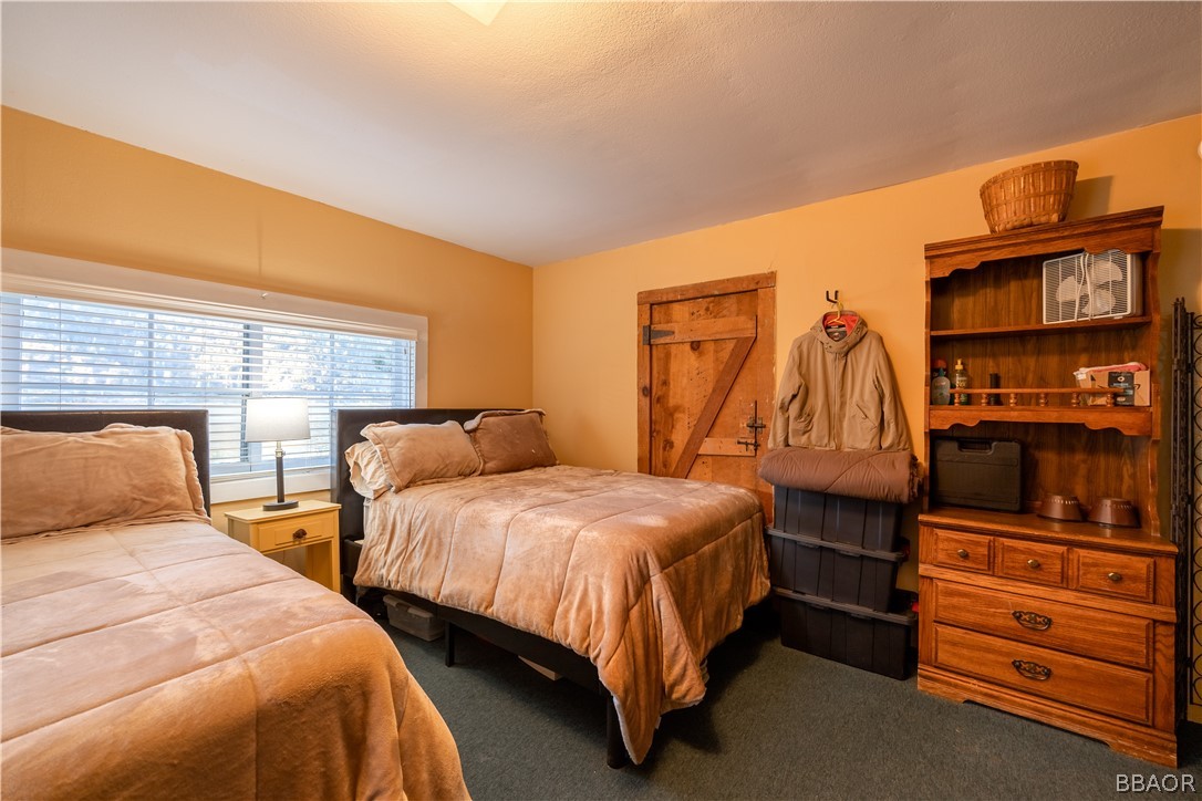 32 Big Bear Boulevard Big Bear Lake, CA 92315 - Photo 32 of 41 a bedroom with two beds and painted walls