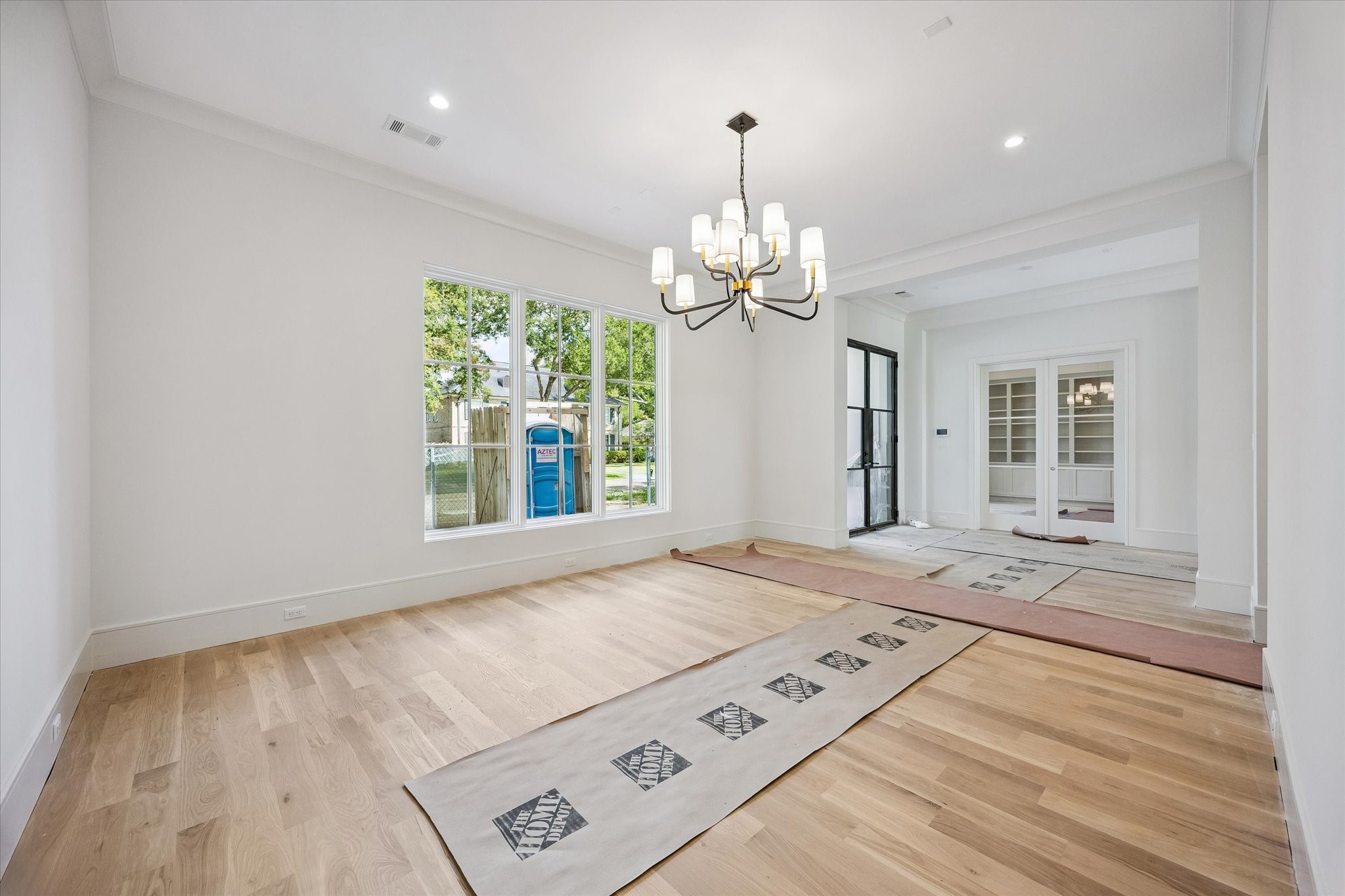 6011 Stones Throw Road Houston, TX 77057 - Photo 7 of 23 Another view of the elegant formal dining room, highlighted by a designer lighting fixture.