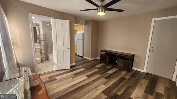 a room with a bed and a window