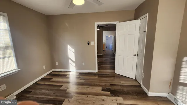 a view of entryway with wooden floor