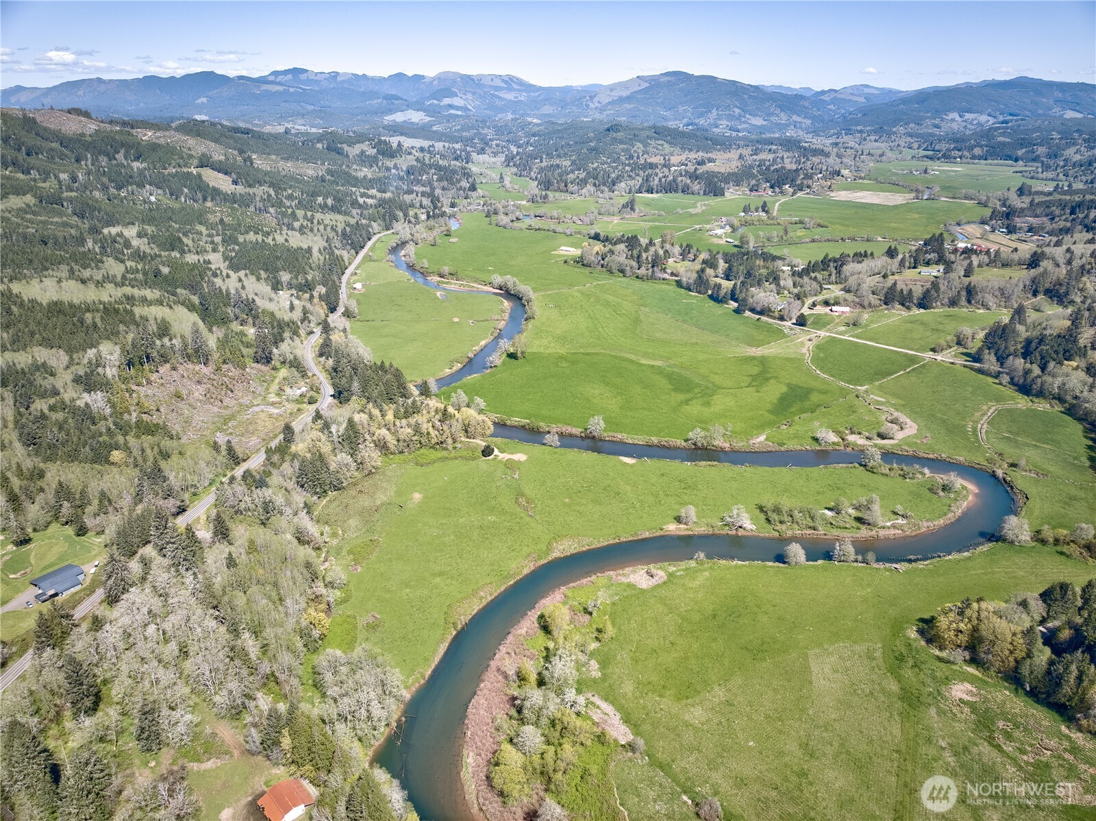 3987 West Sr4 Grays River Grays River, WA 98621 - Photo 9 of 12 a view of a swimming pool with a mountain