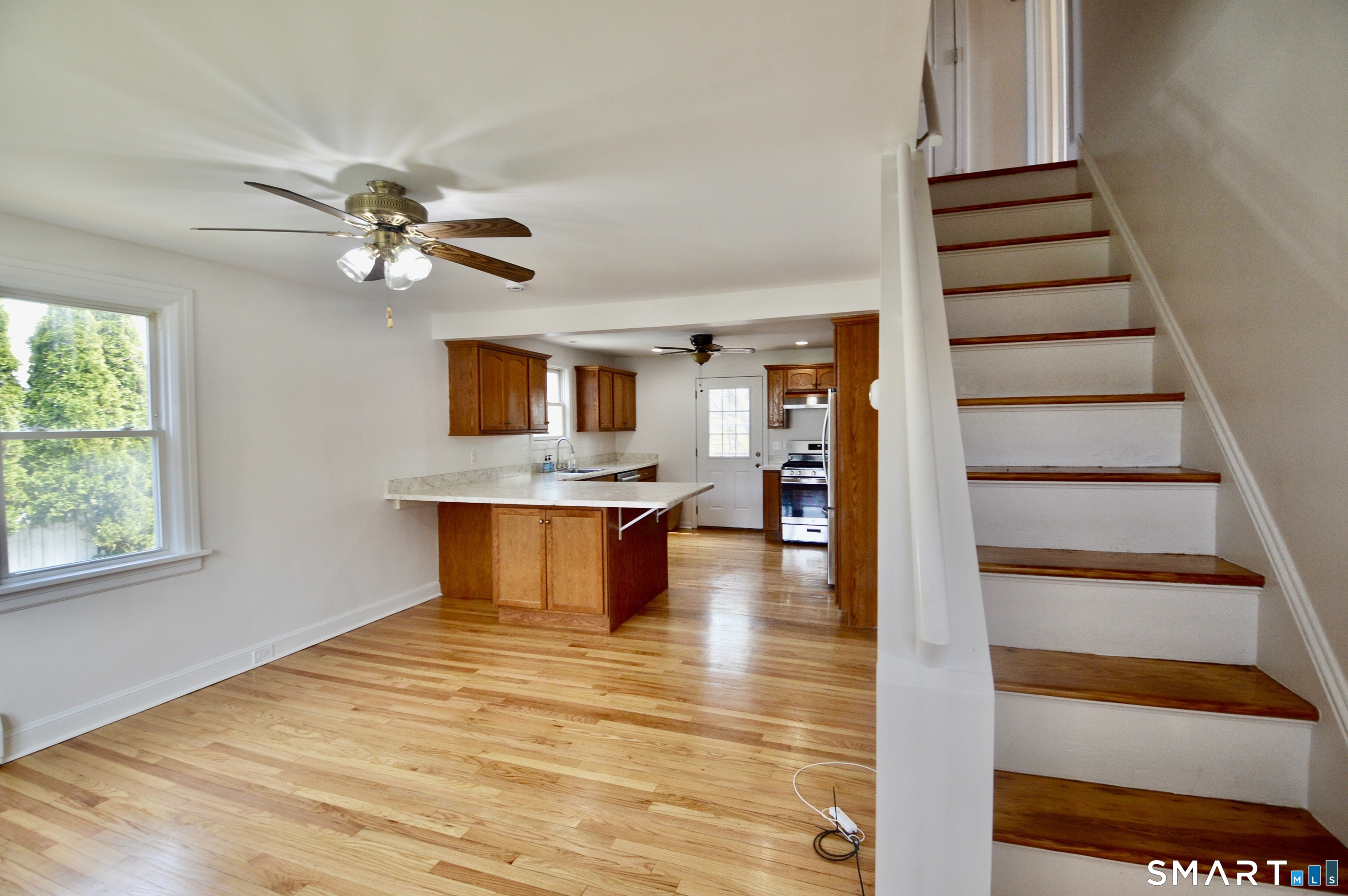 314 Knowlton Street Stratford, CT 06615 - Photo 2 of 26 a view of entryway and hall with wooden floor