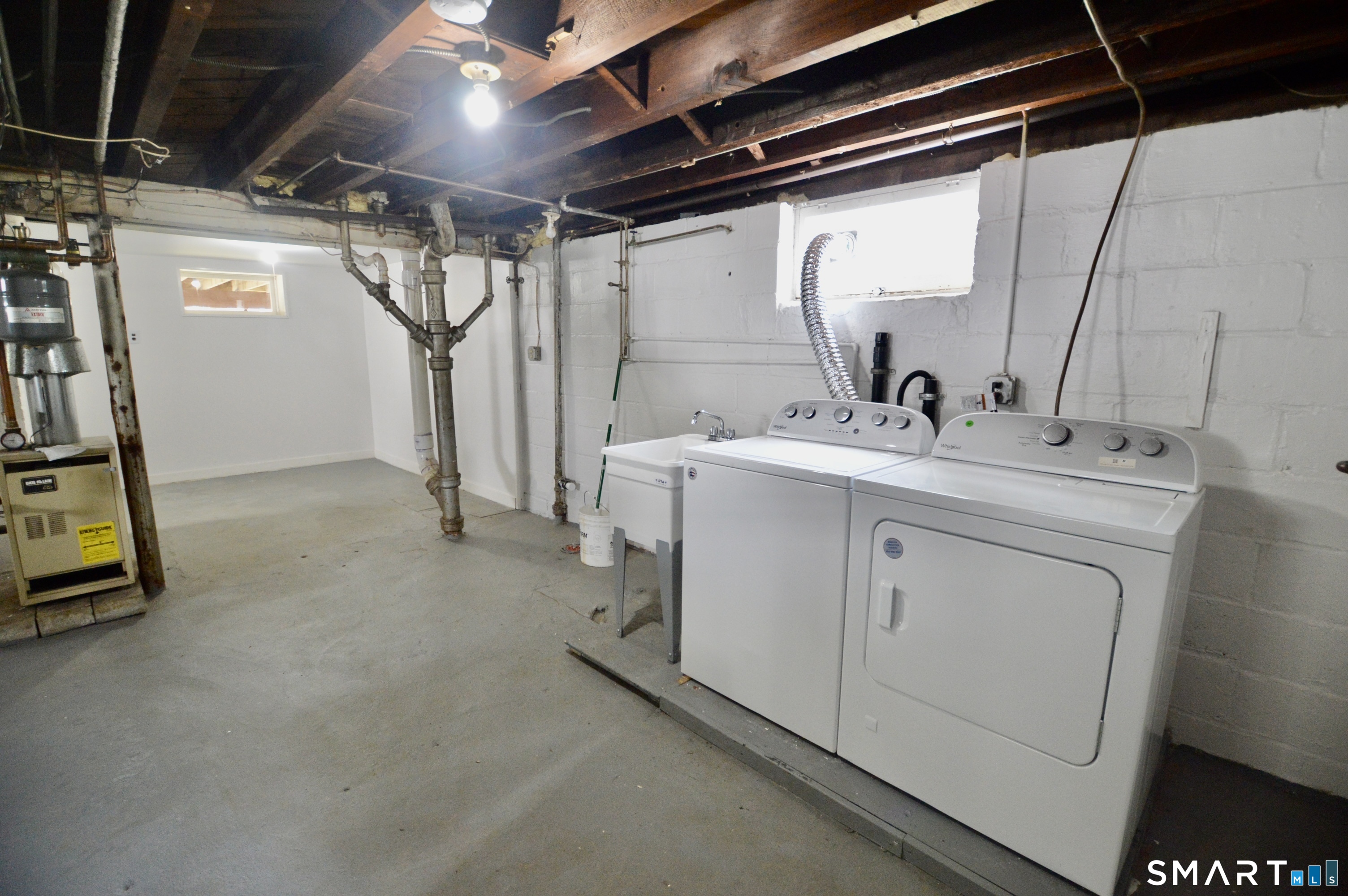 314 Knowlton Street Stratford, CT 06615 - Photo 21 of 26 a utility room with dryer and washer