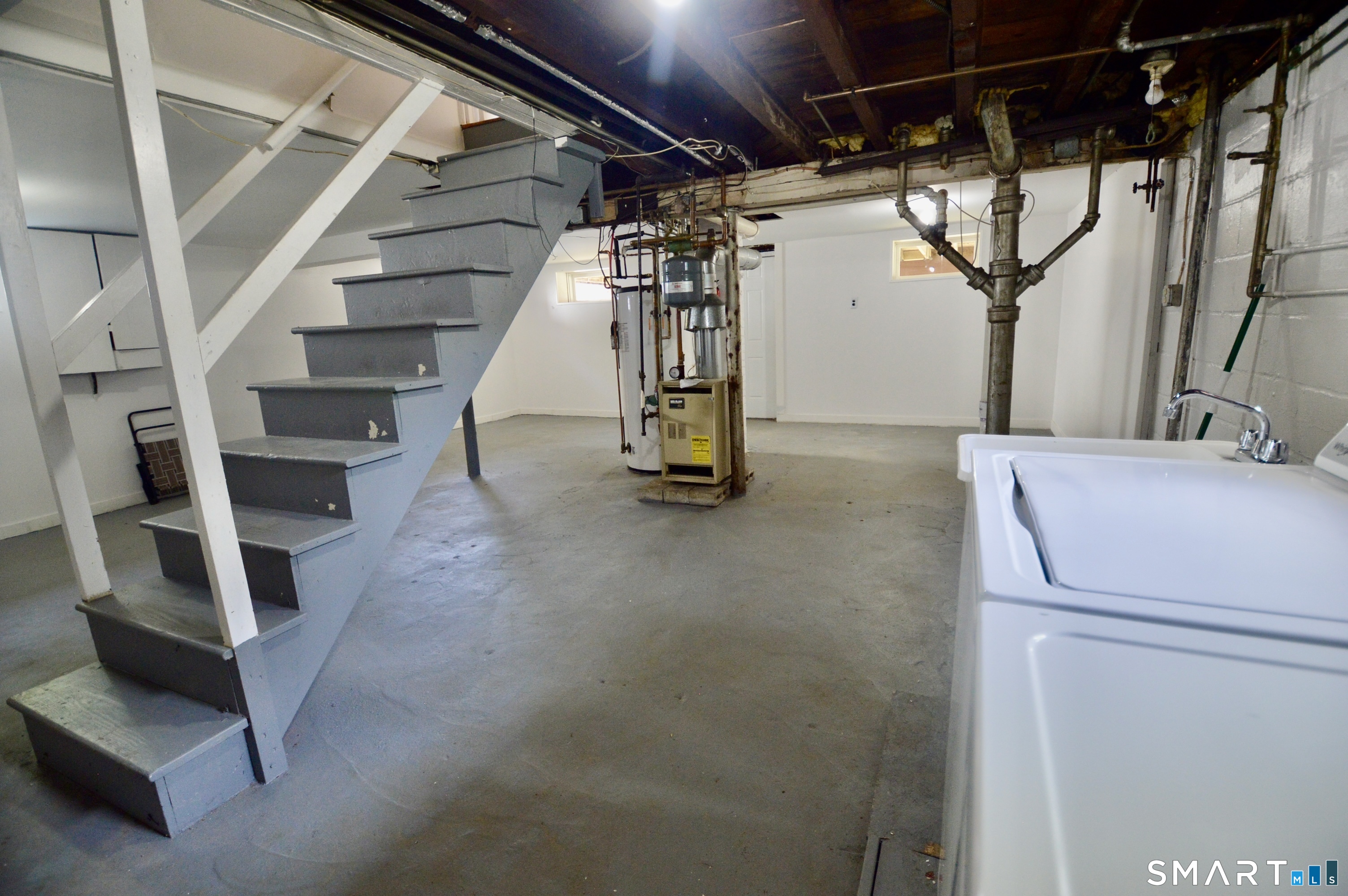 314 Knowlton Street Stratford, CT 06615 - Photo 22 of 26 a view of an empty room with stairs