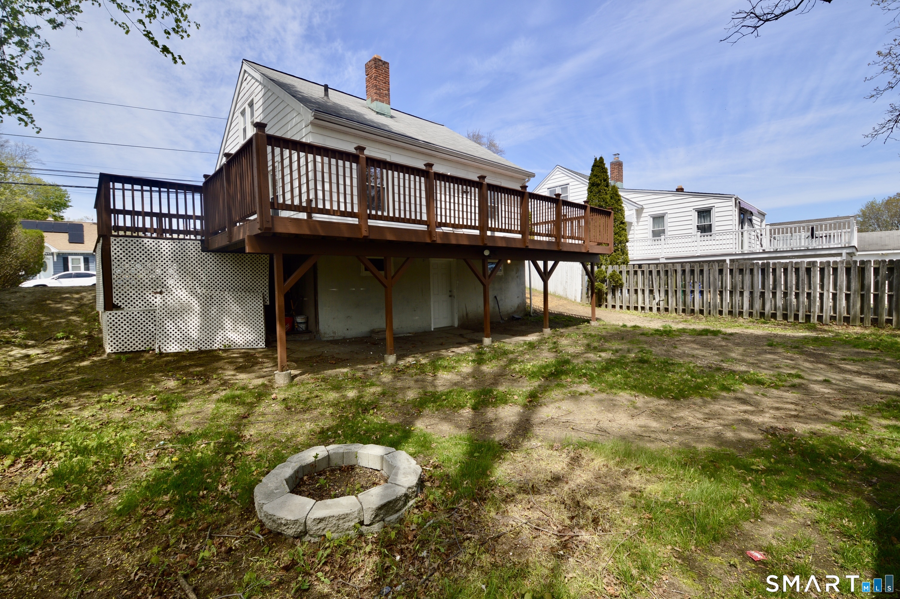 314 Knowlton Street Stratford, CT 06615 - Photo 23 of 26 a view of a house with backyard and deck