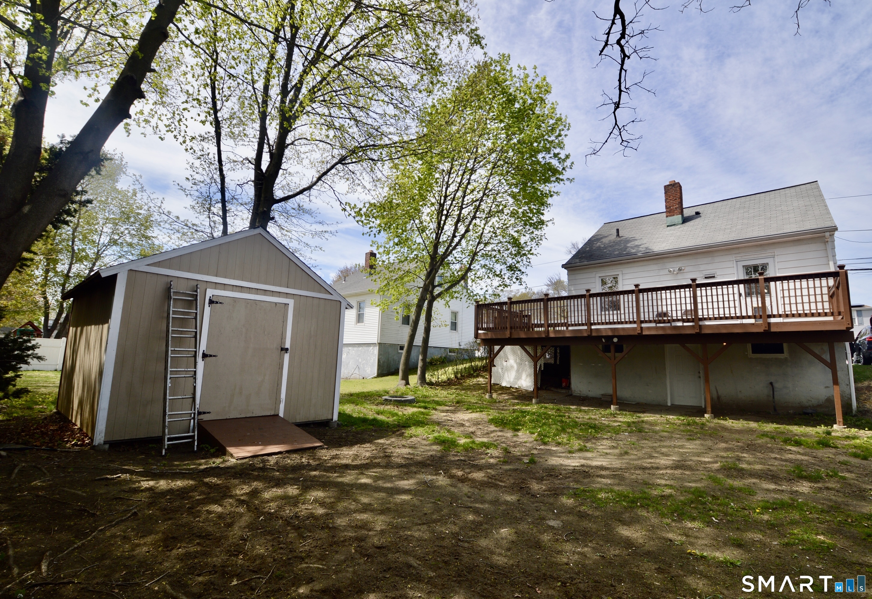 314 Knowlton Street Stratford, CT 06615 - Photo 25 of 26 a view of a house with a large tree