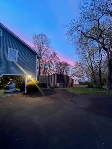 a view of a street with a building