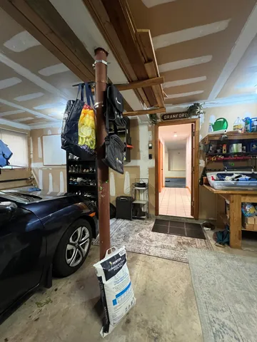 a kitchen with a refrigerator and a stove
