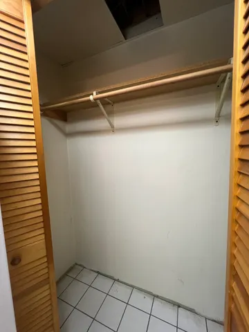 a view of a room with racks on the wall