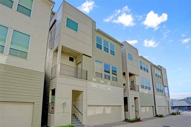 a front view of a building with street view