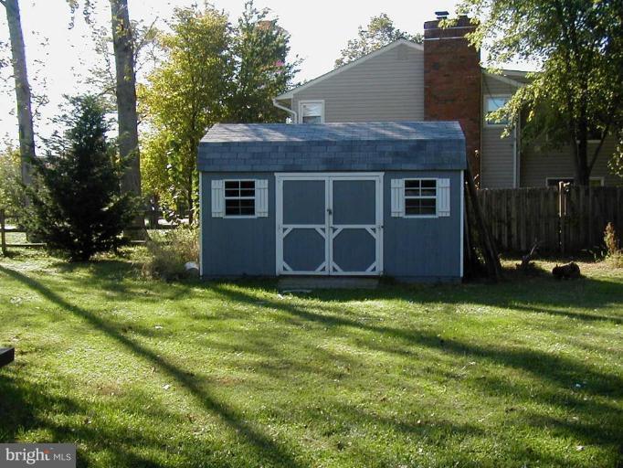 409 Skipper Lane Chester, MD 21619 - Photo 10 of 10 a backyard of a house