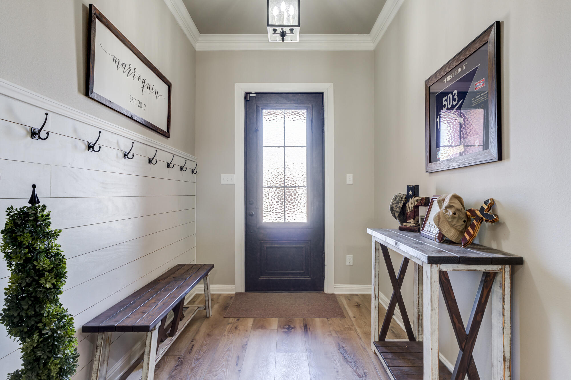 4003 128th Street Lubbock, TX 79423 - Photo 2 of 16 a view of a hallway with workspace