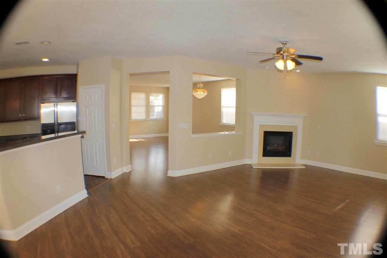 2856 Roundleaf Court Raleigh, NC 27604 - Photo 12 of 24 a view of a livingroom with a kitchen