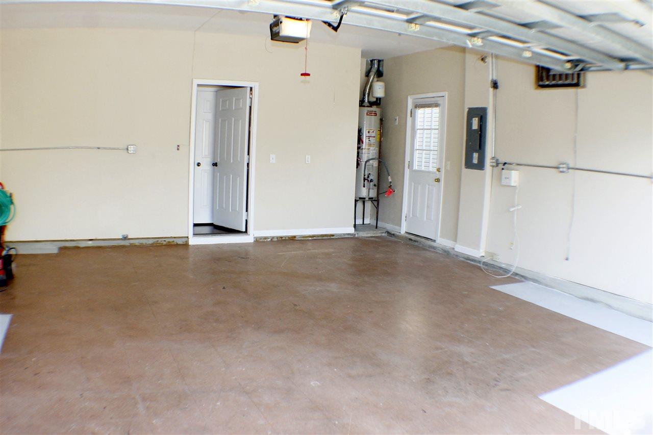 2856 Roundleaf Court Raleigh, NC 27604 - Photo 16 of 24 an empty room with wooden floor and windows