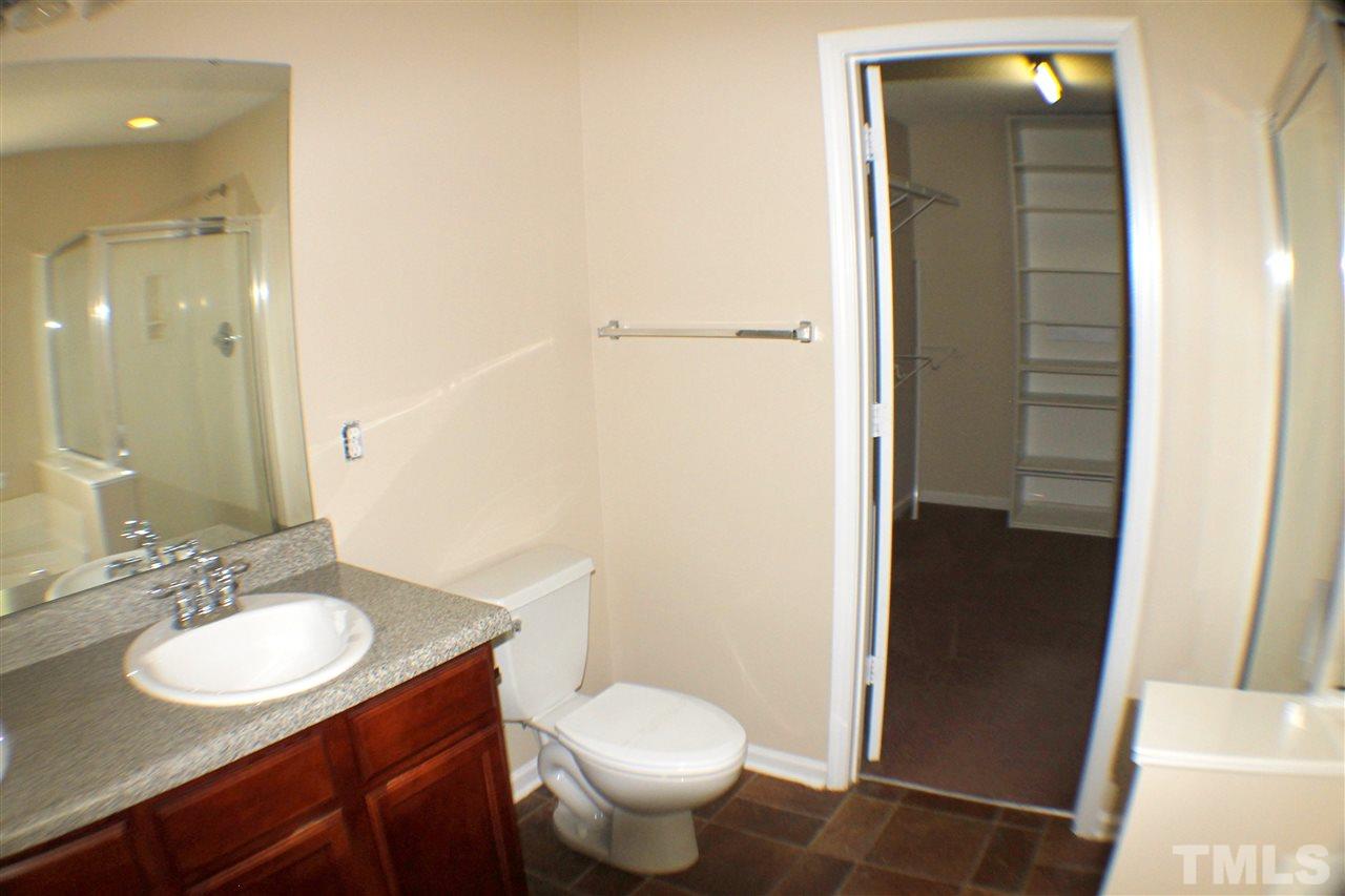 2856 Roundleaf Court Raleigh, NC 27604 - Photo 20 of 24 a bathroom with a sink toilet and shower