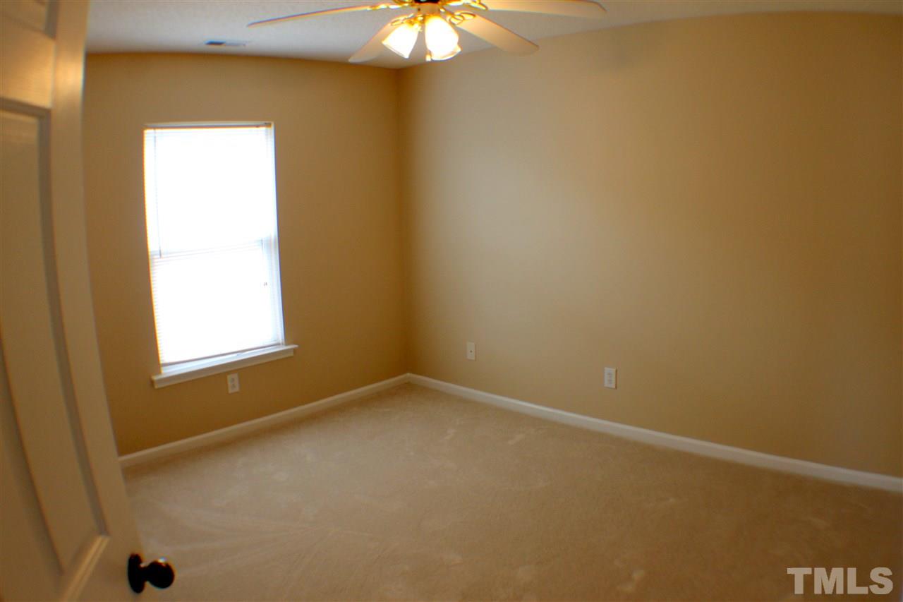 2856 Roundleaf Court Raleigh, NC 27604 - Photo 22 of 24 an empty room with a window