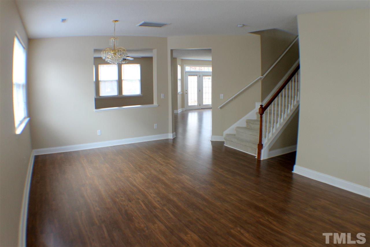 2856 Roundleaf Court Raleigh, NC 27604 - Photo 7 of 24 a view of entryway and hall with wooden floor