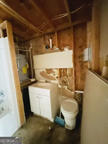 a bathroom with a sink and toilet