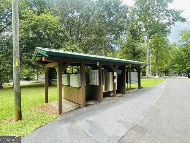 a view of a patio with a table and chairs
