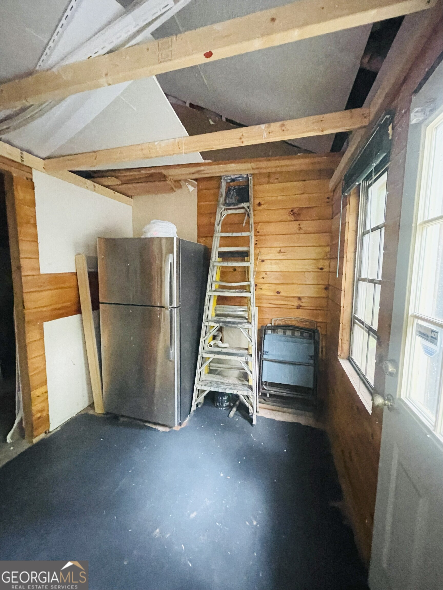 95 Hillcrest Court Cleveland, GA 30528 - Photo 4 of 26 a view of an empty room with a window
