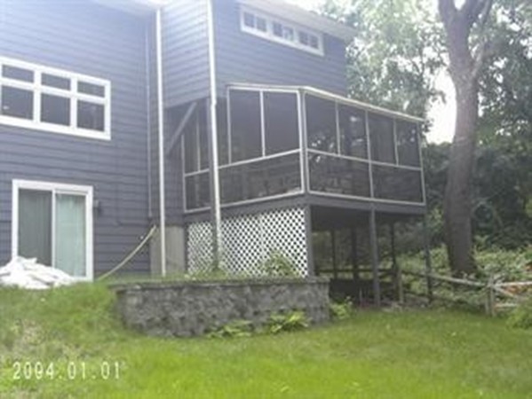 22 Jane Road Marblehead, MA 01945 - Photo 3 of 6 a front view of a house with a yard