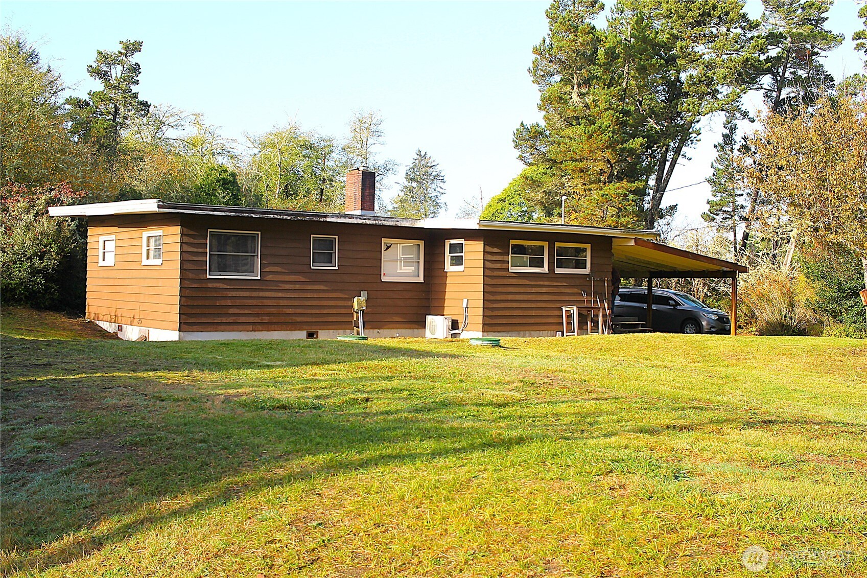 2621 Tokeland Road Tokeland, WA 98590 - Photo 2 of 38 a front view of a house with a yard