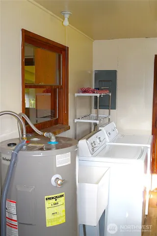 a view of a bench in the patio next to a yard