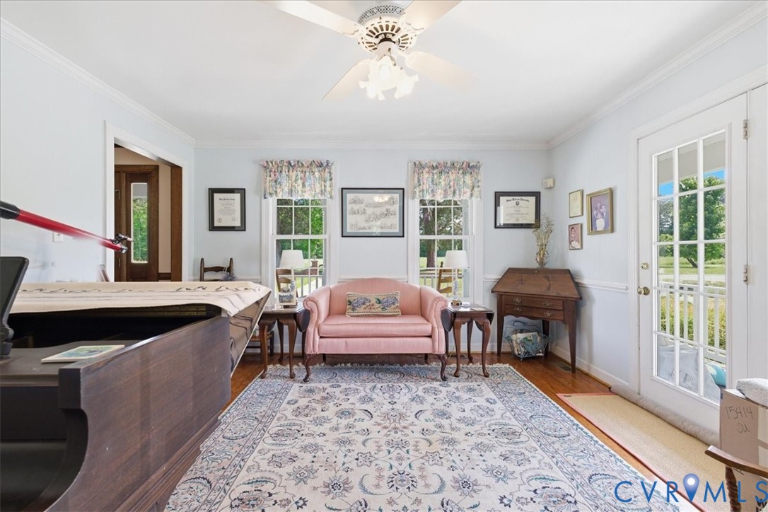15414 Sunnybrook Road Petersburg, VA 23805 - Photo 7 of 29 a living room with furniture and a fireplace
