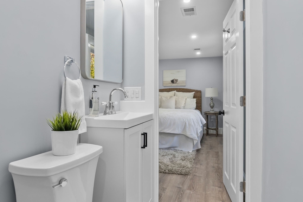 106 Hull Street Beverly, MA 01915 - Photo 14 of 34 a bathroom with a sink and a mirror