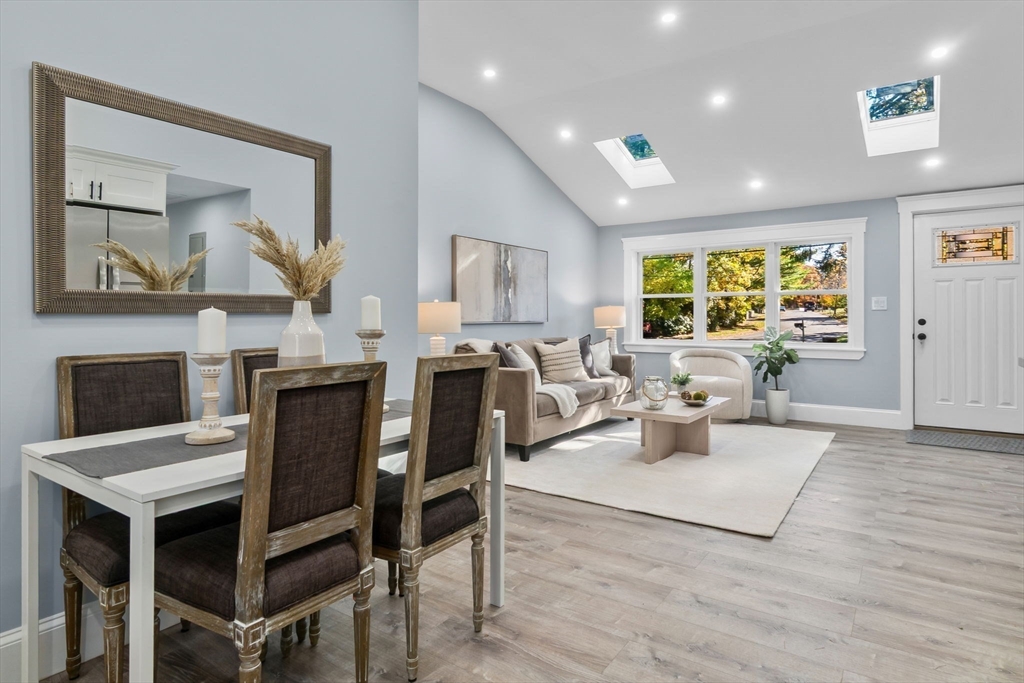 106 Hull Street Beverly, MA 01915 - Photo 6 of 34 a view of a dining room with furniture window and wooden floor