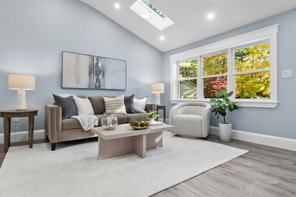 106 Hull Street Beverly, MA 01915 - Photo 8 of 34 a living room with furniture and a large window
