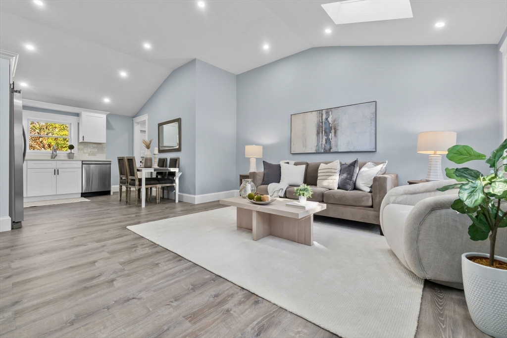 106 Hull Street Beverly, MA 01915 - Photo 9 of 34 a living room with furniture and wooden floor