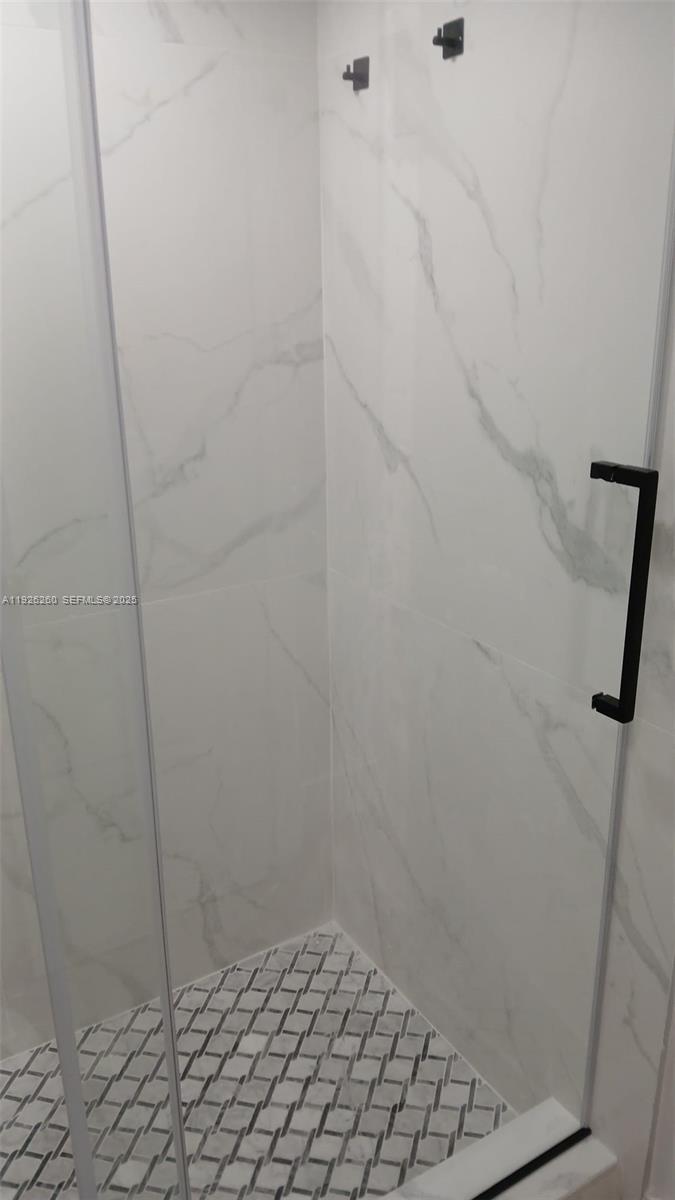 9682 Fontainebleau Boulevard, Unit 312 Miami, FL 33172 - Photo 12 of 33 a view of a bathroom